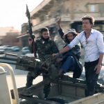 Justin Hall Nat Geo Explorer Runningman Libya Riding with Rebels