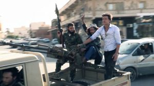 Justin Hall Nat Geo Explorer Runningman Libya Riding with Rebels